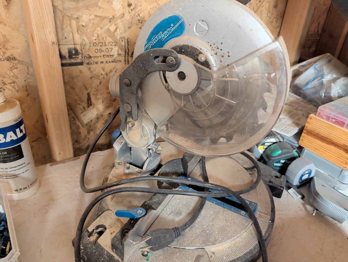 Used circular saw with dust and wear visible